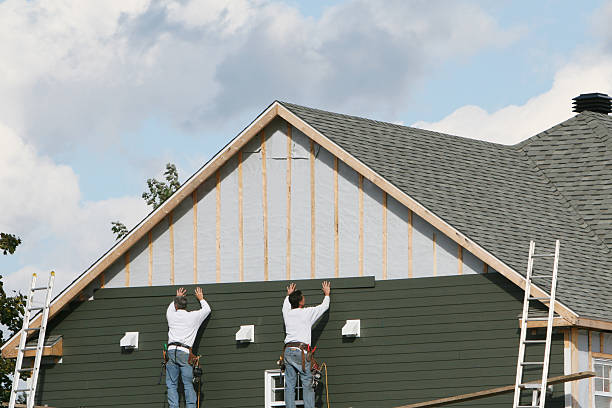 Professional Storm Damage Siding Repair technician working in Lisle, IL